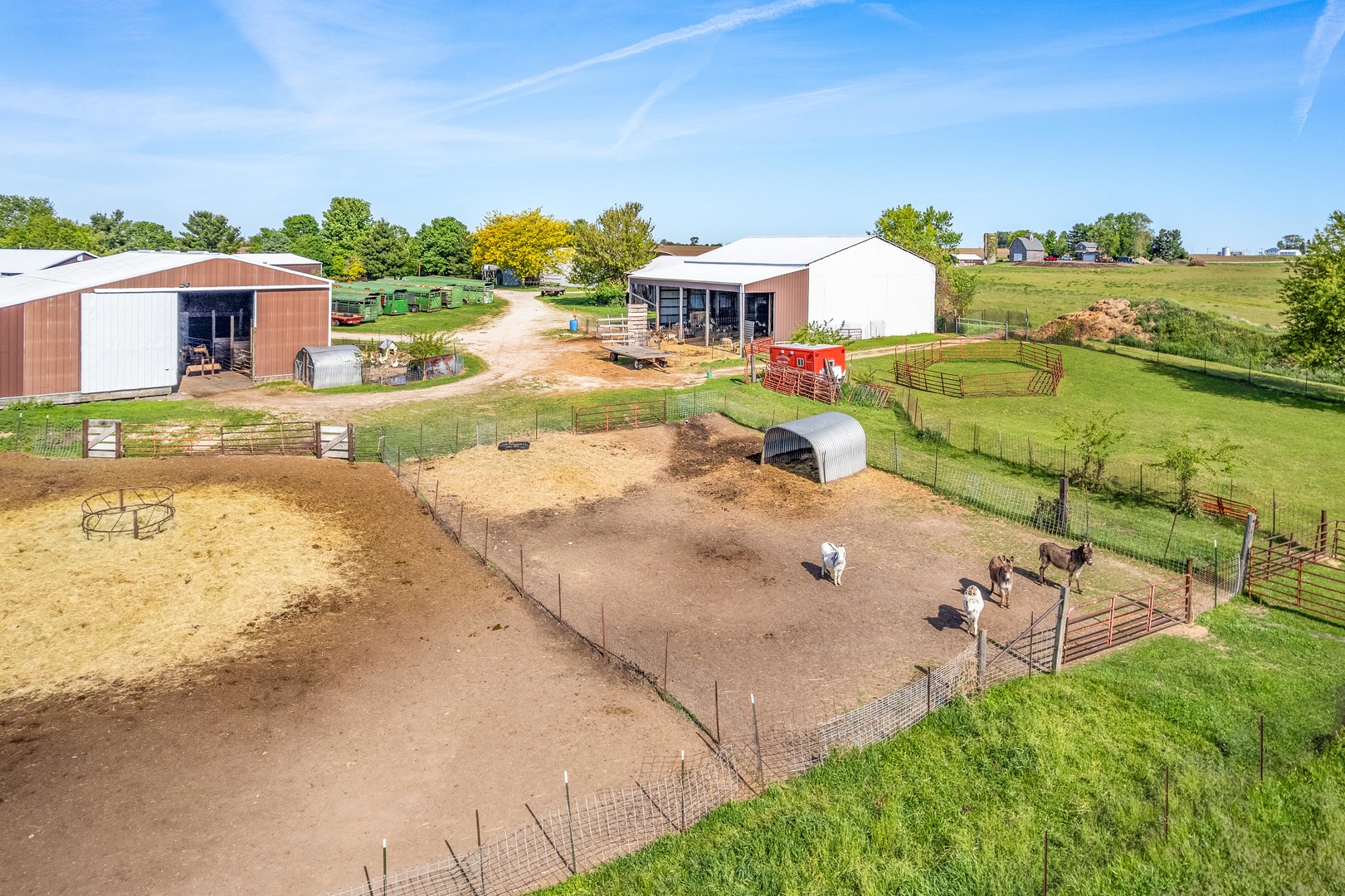 15534 Somonauk Road DeKalb, IL 60115 - Photo 36 of 48 an aerial view of a house with swimming pool garden and patio