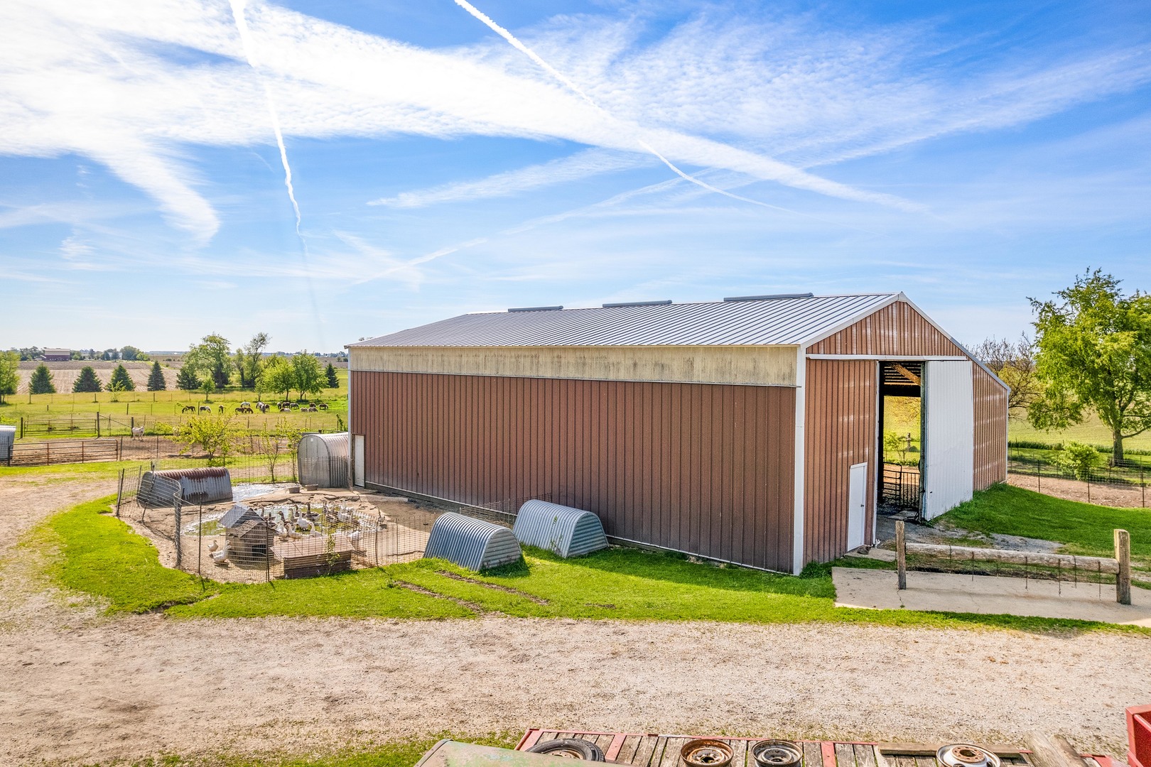 15534 Somonauk Road DeKalb, IL 60115 - Photo 40 of 48 a front view of a house with garden