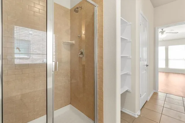 a view of a bathroom from a hallway