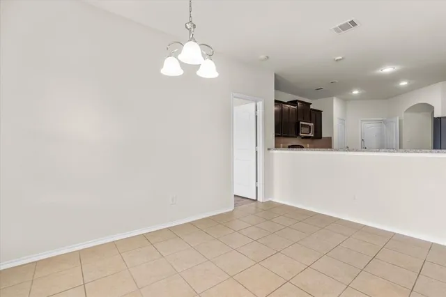 a view of a kitchen with a sink