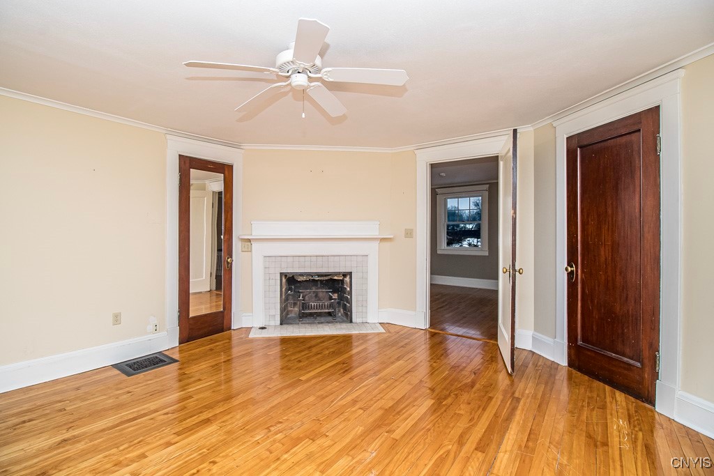 104 Burlingame Road Syracuse, NY 13203 - Photo 31 of 50 Bedroom featuring 2 closets, beautiful hardwood fl