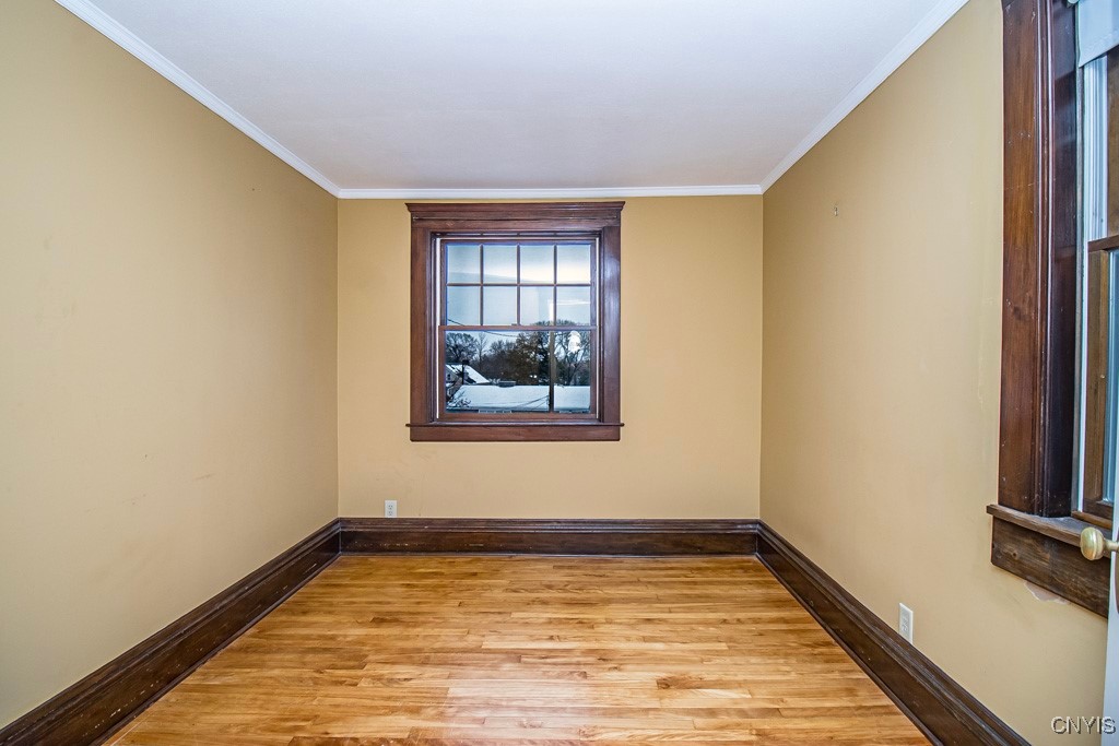 104 Burlingame Road Syracuse, NY 13203 - Photo 37 of 50 Bedroom with hardwood floors and a closet