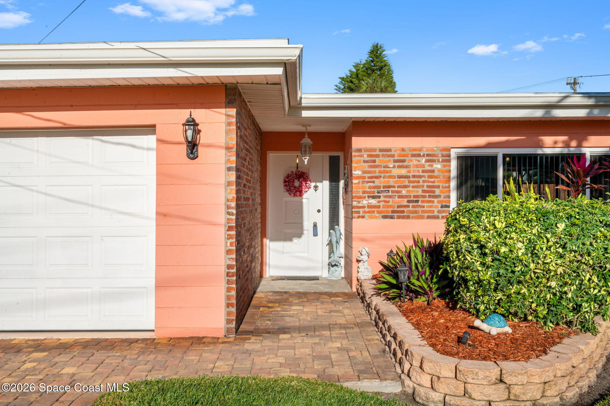 1044 Samar Road Cocoa Beach, FL 32931 - Photo 19 of 56 a view of a entryway door front of house