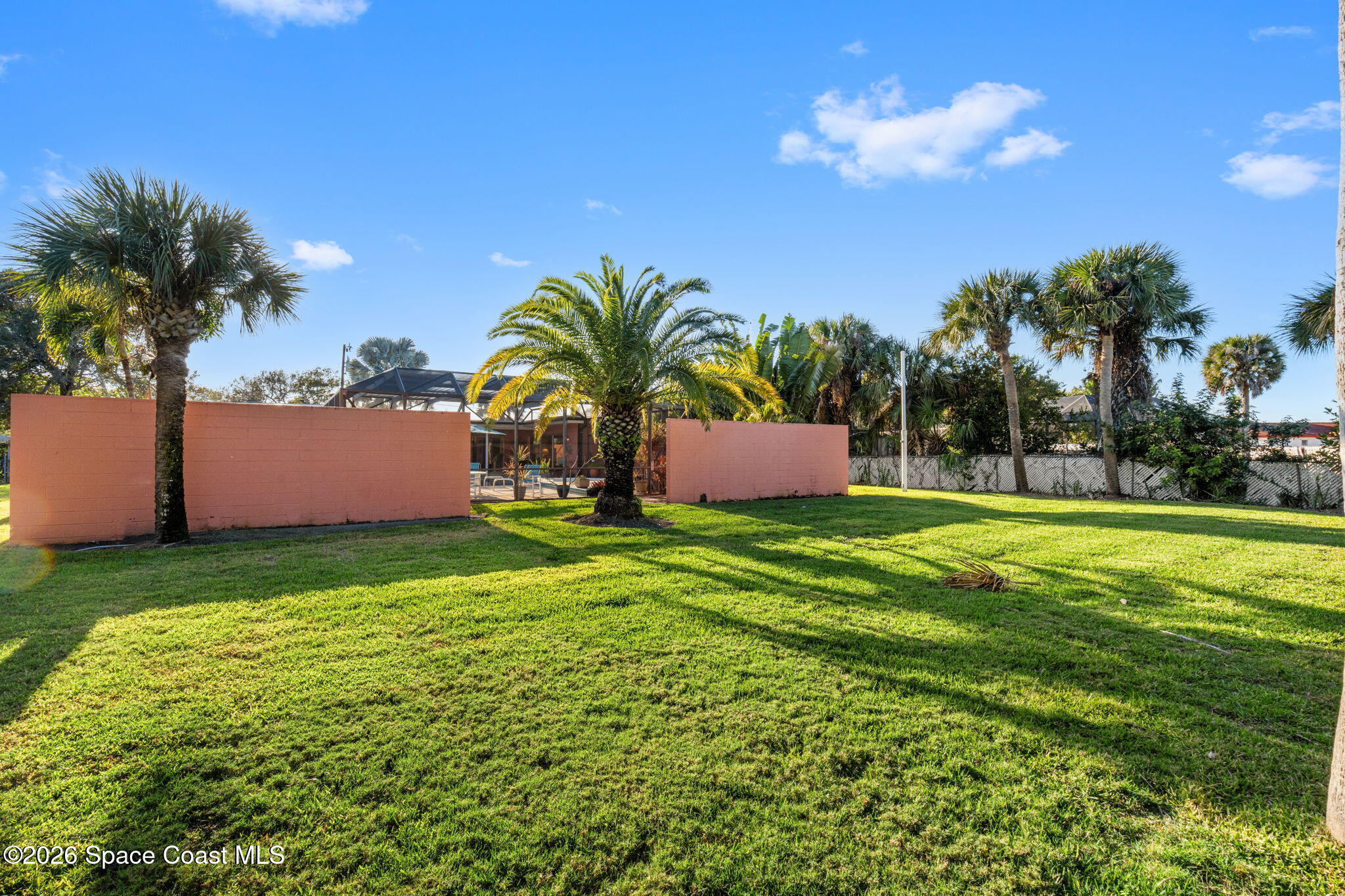 1044 Samar Road Cocoa Beach, FL 32931 - Photo 4 of 56 a fire hydrant in the middle of a field
