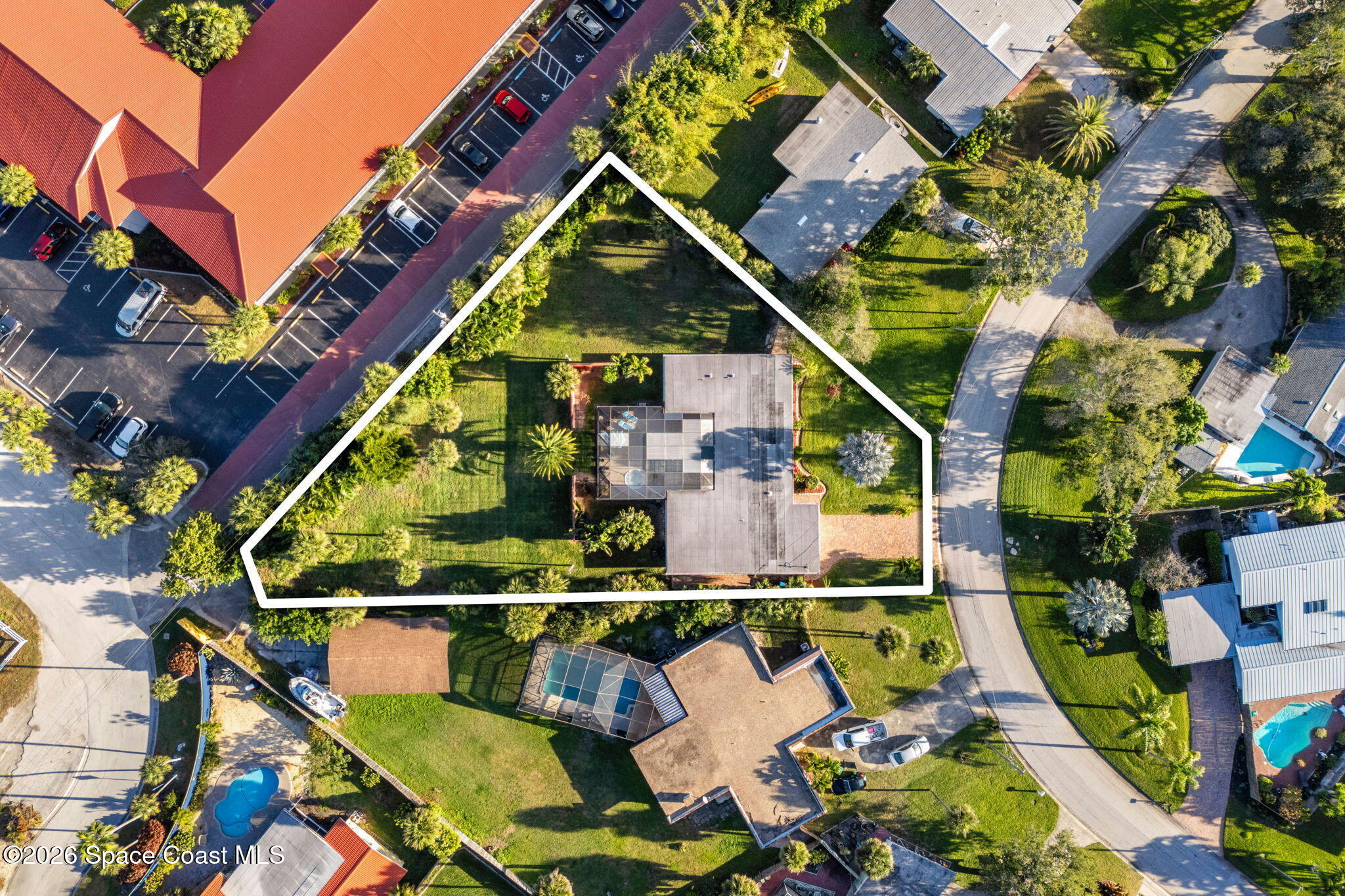 1044 Samar Road Cocoa Beach, FL 32931 - Photo 4 of 56 DJI_20260117141707_0024_D copy