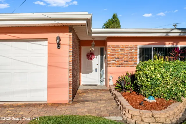a view of swimming pool with a table and chairs