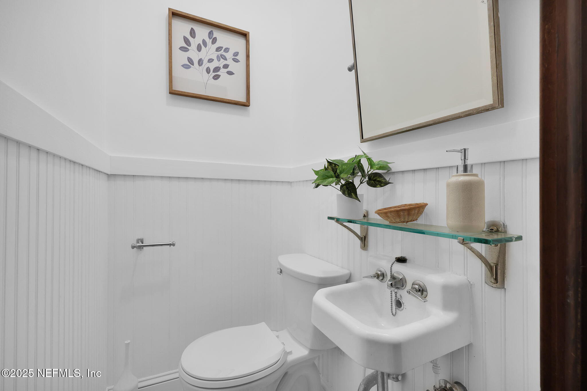 1475 Edgewood Circle Jacksonville, FL 32205 - Photo 26 of 60 a bathroom with a sink toilet and mirror