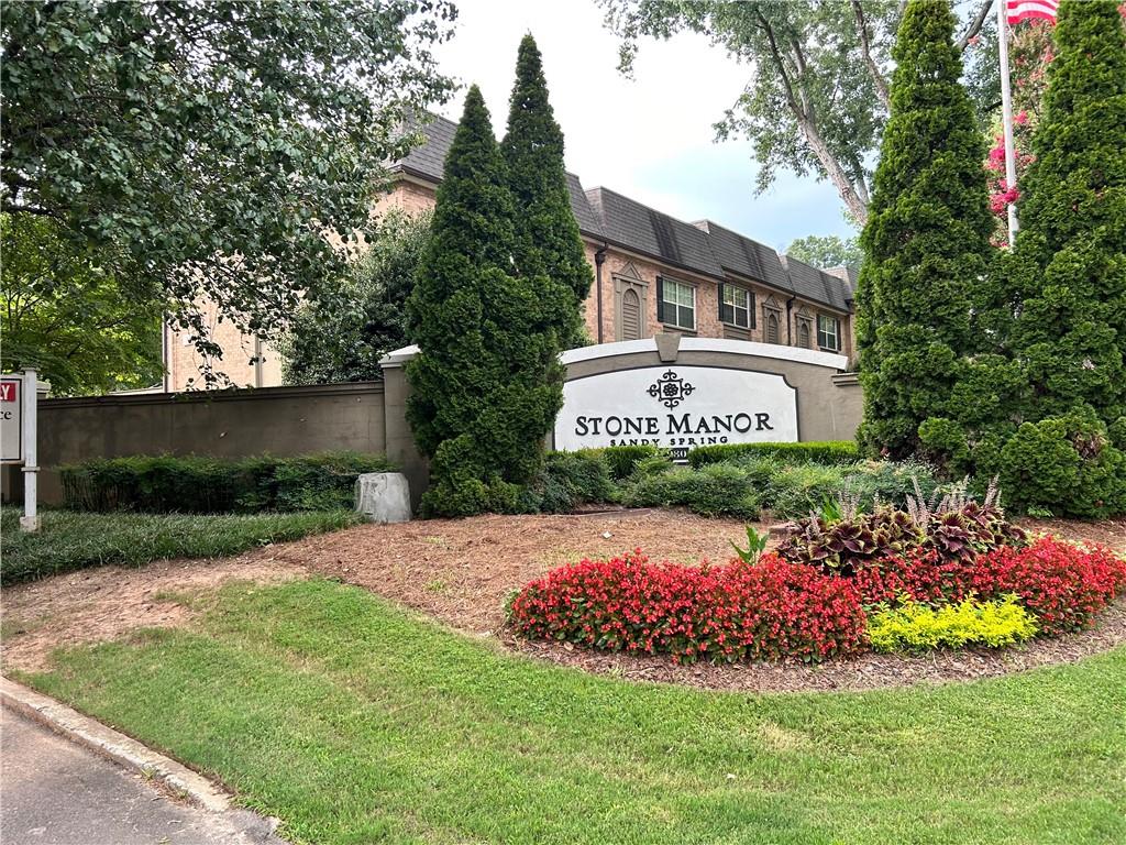 6980 Roswell Road, Unit P3 Atlanta, GA 30328 - Photo 1 of 1 a sign on the side of the house