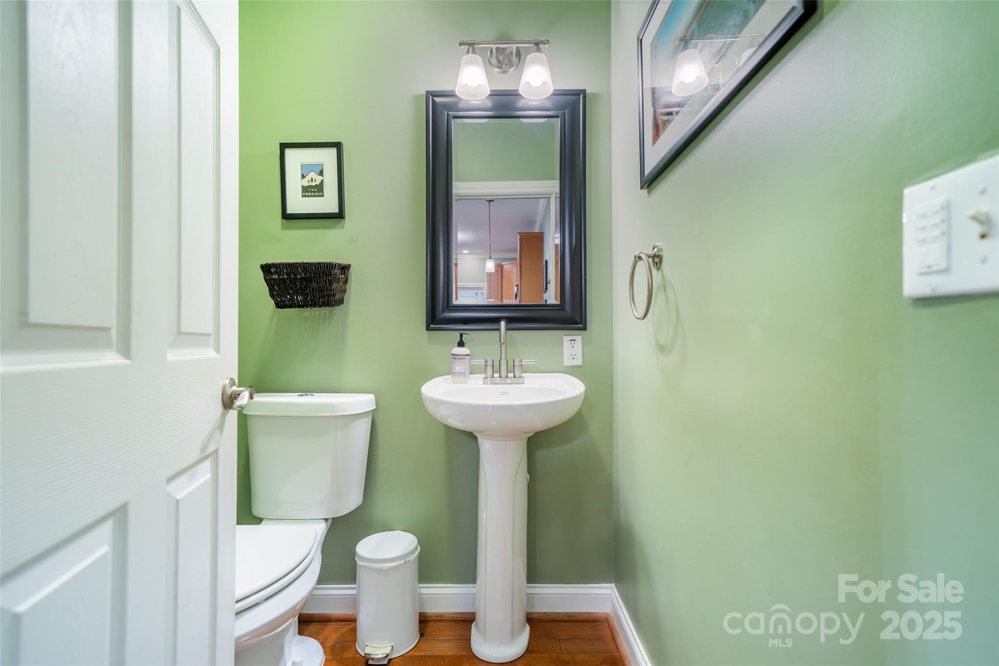 11 Forest Park Lane Asheville, NC 28803 - Photo 16 of 26 a bathroom with a sink mirror and toilet