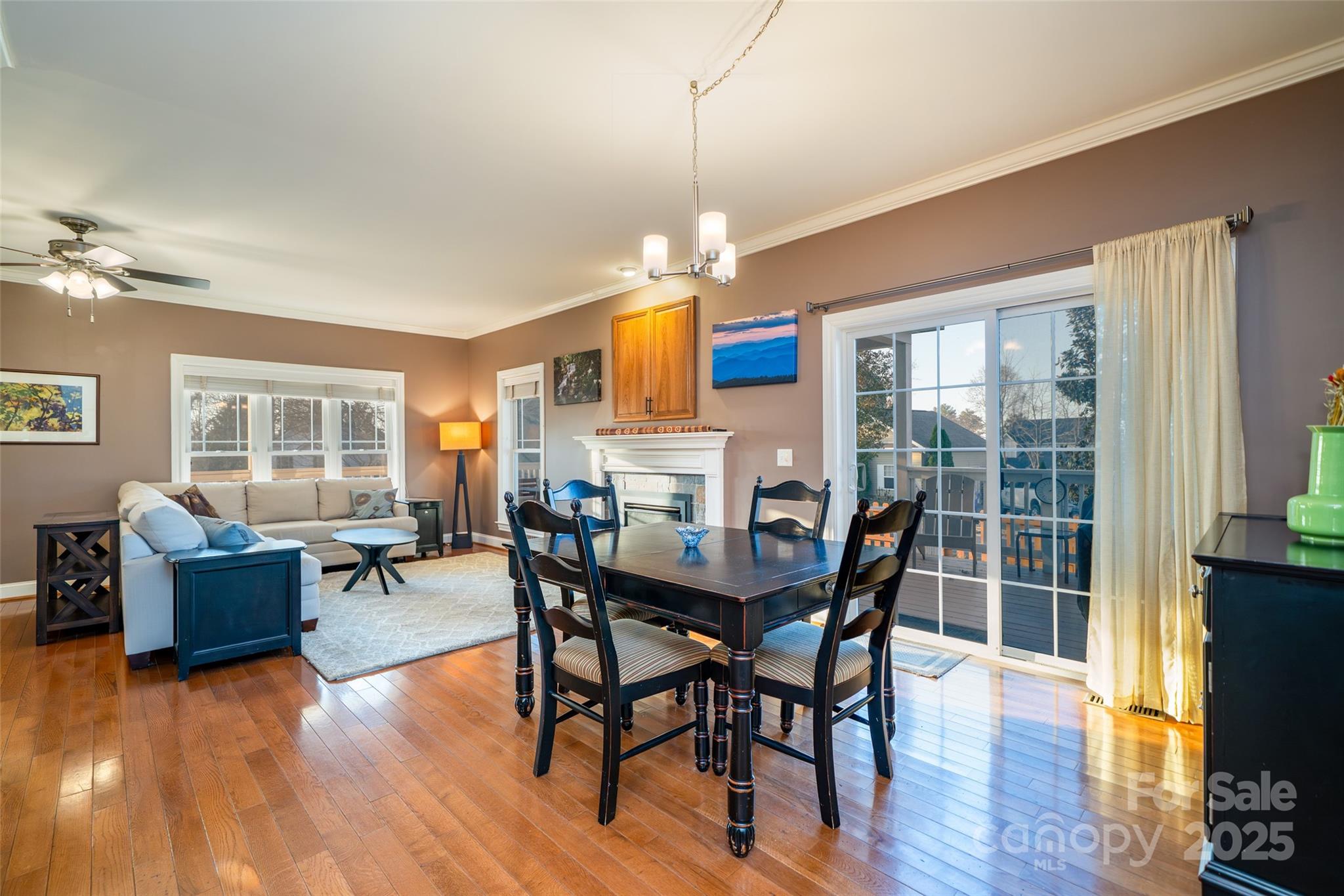 11 Forest Park Lane Asheville, NC 28803 - Photo 7 of 26 a view of a dining room with furniture window and wooden floor