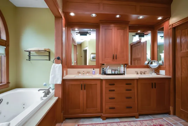 a view of a backyard with large trees