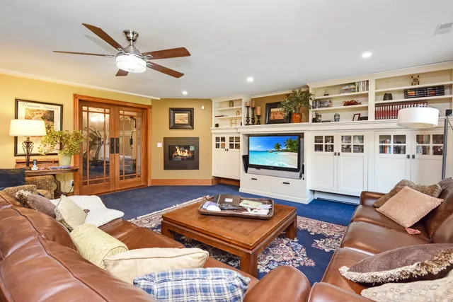 a kitchen with stainless steel appliances granite countertop a stove and a refrigerator