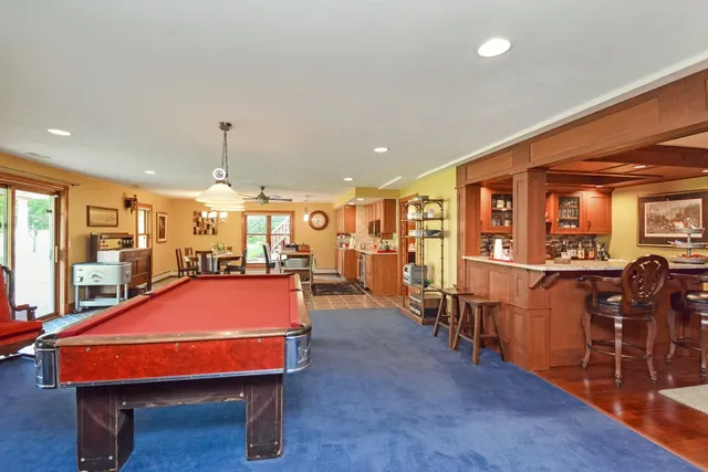 a living room with furniture or couch and a flat screen tv