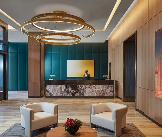 a living room with furniture and a rug