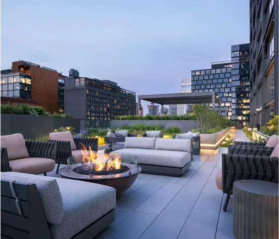 a outdoor living space with patio furniture and a garden