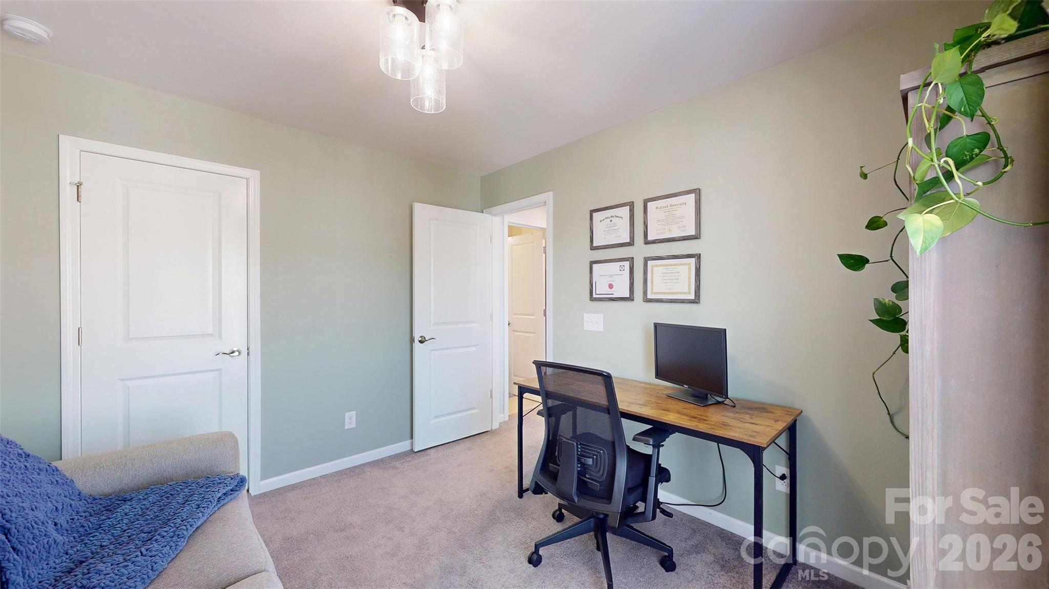 827 Canoe Song Road Fort Mill, SC 29708 - Photo 21 of 33 a workspace with furniture and a chandelier