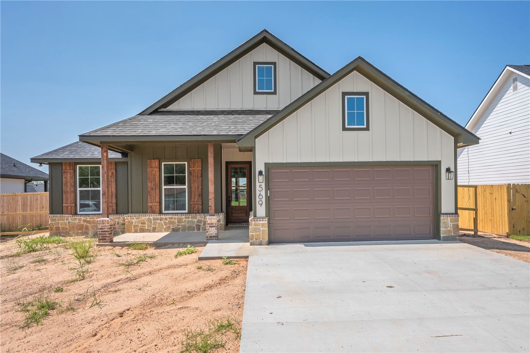569 Harvest Lk Drive Snook, TX 77879 - Photo 1 of 22 Modern farmhouse with covered porch, a shingled roof, board and batten siding, concrete driveway, and a garage