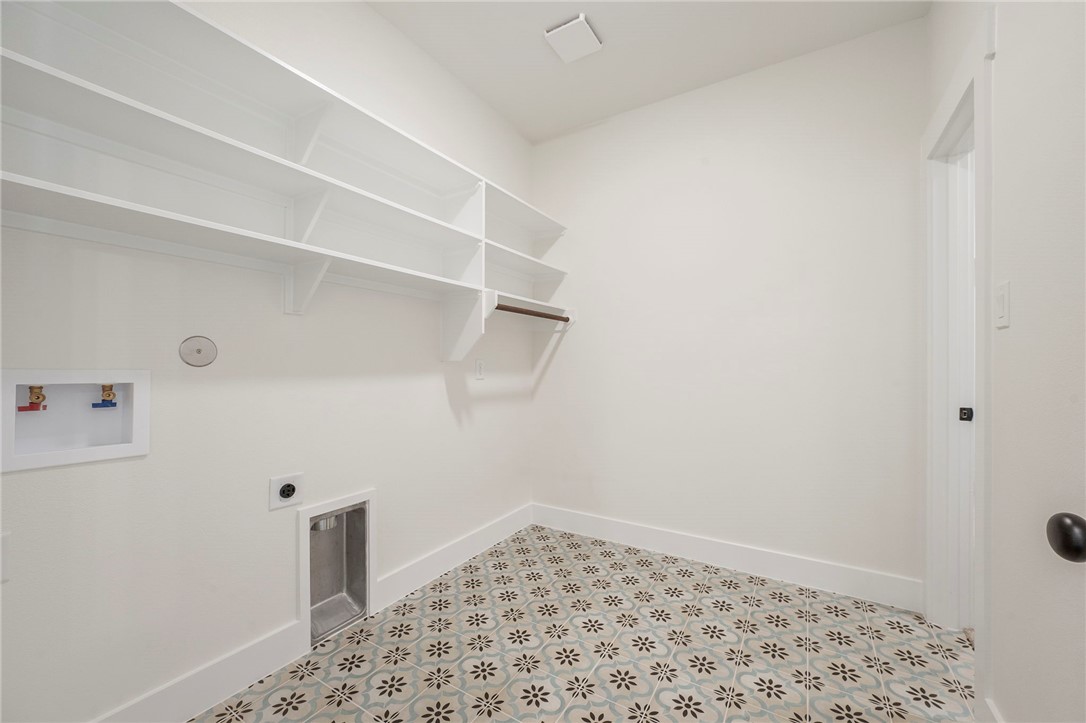569 Harvest Lk Drive Snook, TX 77879 - Photo 20 of 22 Laundry room with washer hookup and electric dryer hookup