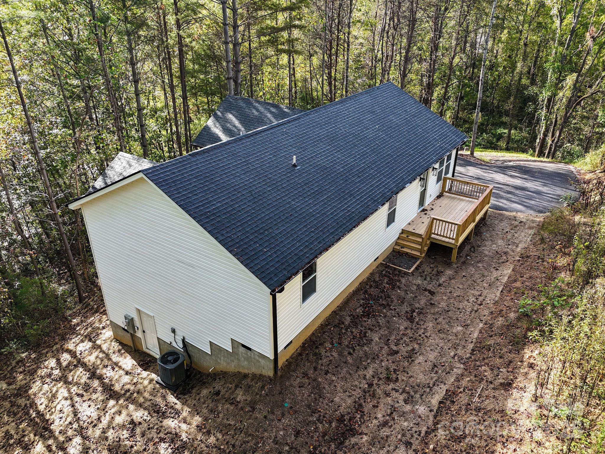 700 Old Fort Road Fairview, NC 28730 - Photo 5 of 42 a view of backyard with outdoor seating and trees