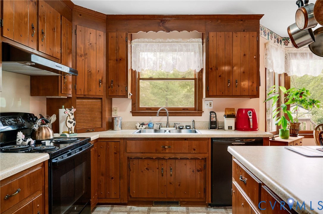 17707 Loving Union Road Disputanta, VA 23842 - Photo 9 of 42 Kitchen featuring wood cabinetry, light-toned coun