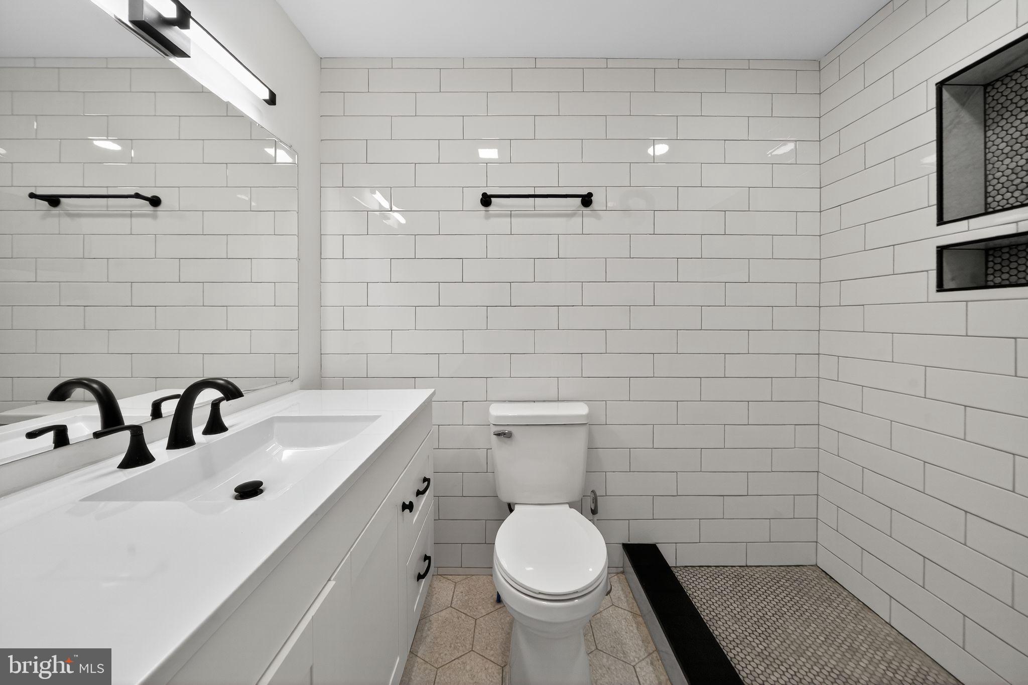 1607 South Bancroft Street Philadelphia, PA 19145 - Photo 4 of 27 1st Floor Bathroom