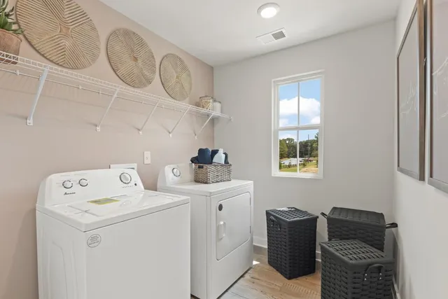 a utility room with dryer and washer
