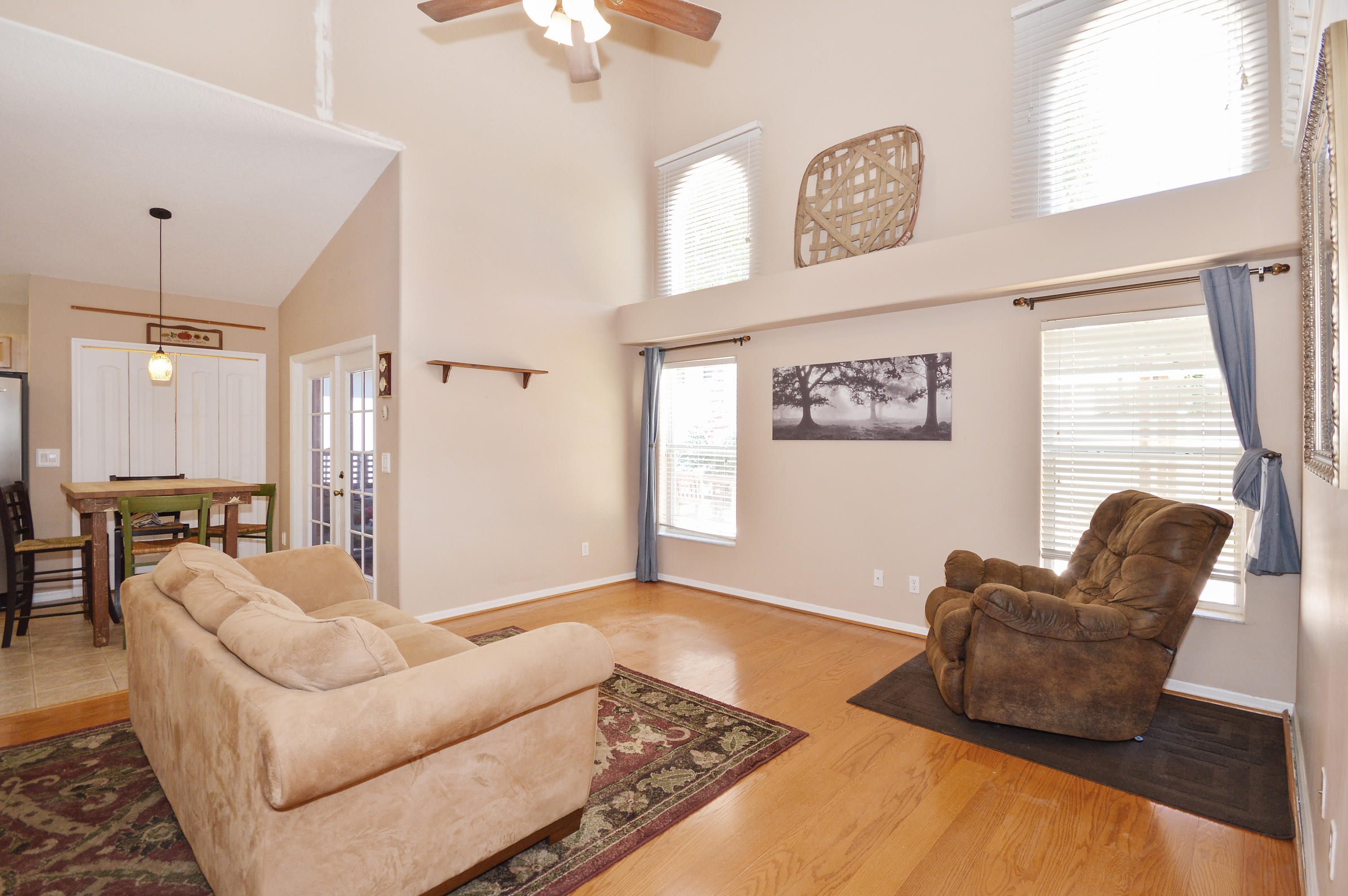 1132 Canoe Point Delray Beach, FL 33444 - Photo 5 of 16 a living room with furniture rug and window