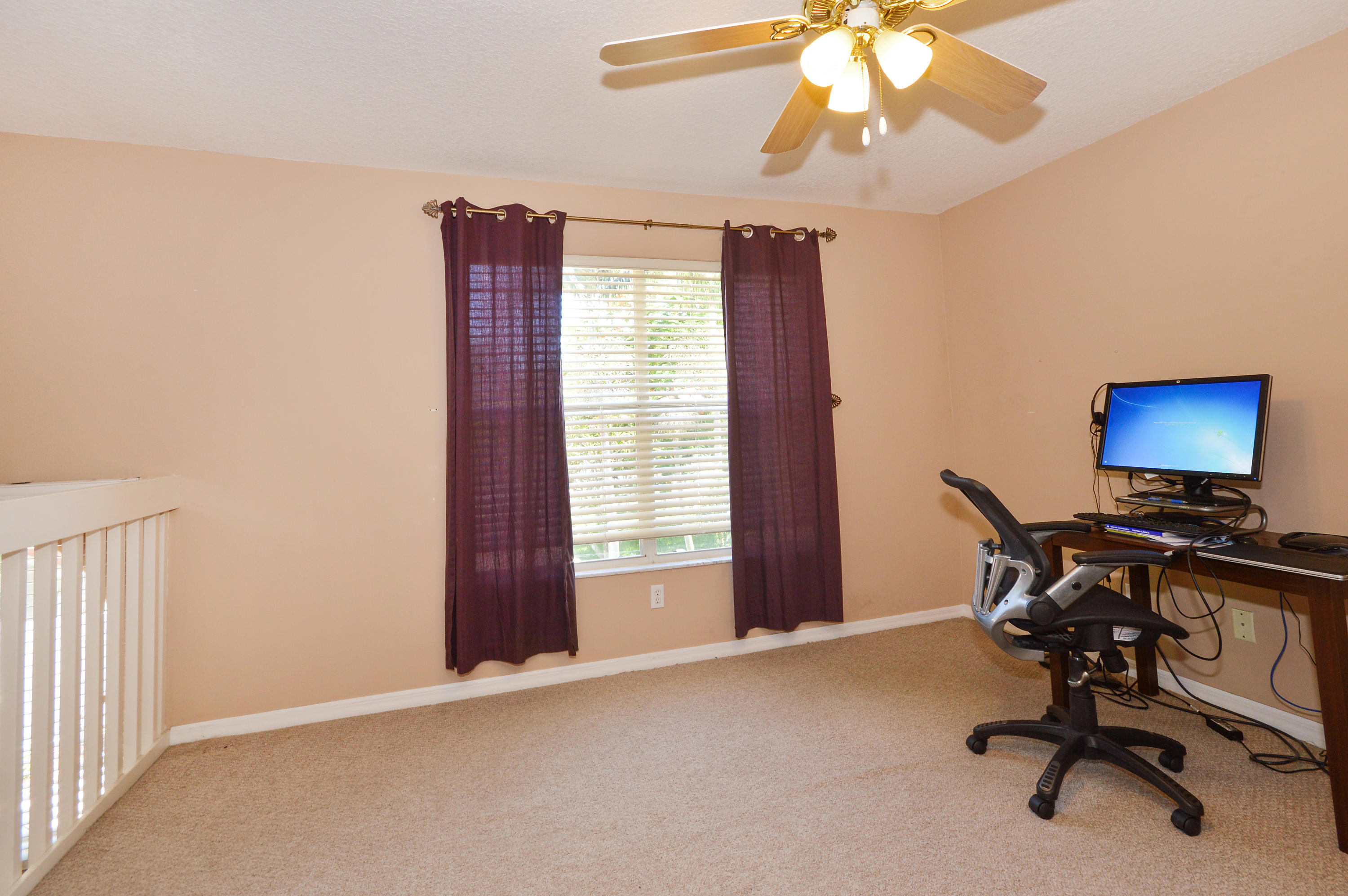 1132 Canoe Point Delray Beach, FL 33444 - Photo 7 of 16 a view of a workspace with furniture and a window