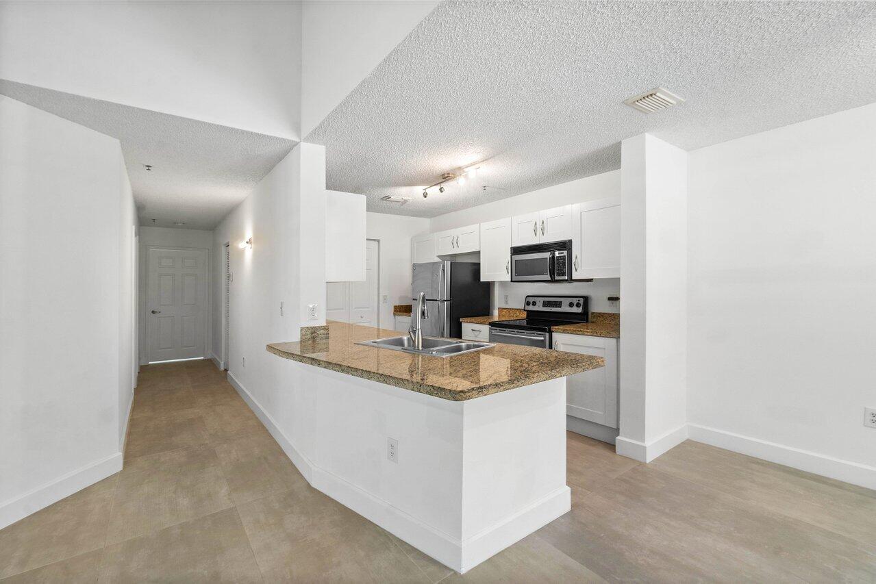 3131 Clint Moore Road, Unit 202 Boca Raton, FL 33496 - Photo 5 of 38 009-3131ClintMooreRoad-BocaRaton-FL-3349