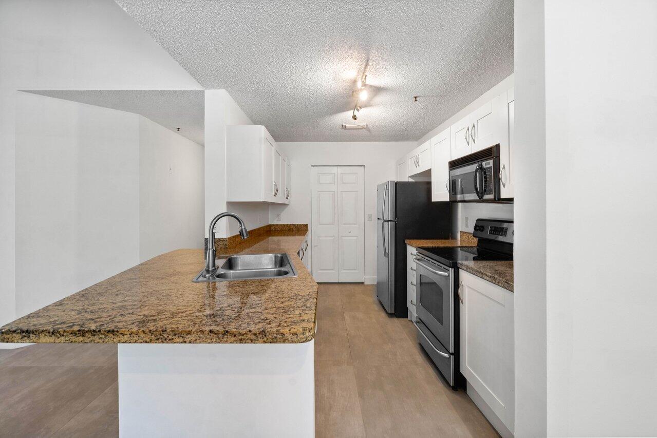 3131 Clint Moore Road, Unit 202 Boca Raton, FL 33496 - Photo 6 of 38 010-3131ClintMooreRoad-BocaRaton-FL-3349