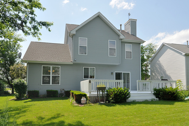 1056 Teasel Lane Aurora, IL 60504 - Photo 25 of 25 a front view of house with yard and green space