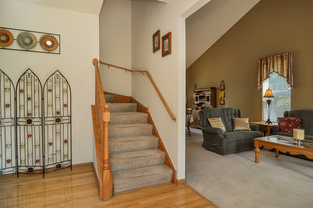 1056 Teasel Lane Aurora, IL 60504 - Photo 3 of 25 a living room with furniture and a floor to ceiling window