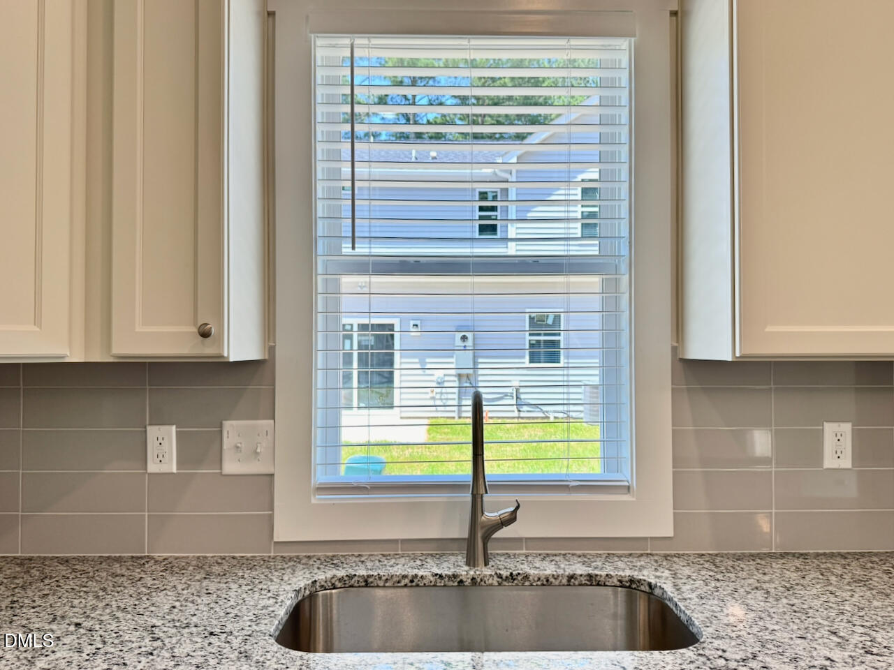 218 George Street, Unit A Four Oaks, NC 27524 - Photo 8 of 28 Quartz + Sink Detail