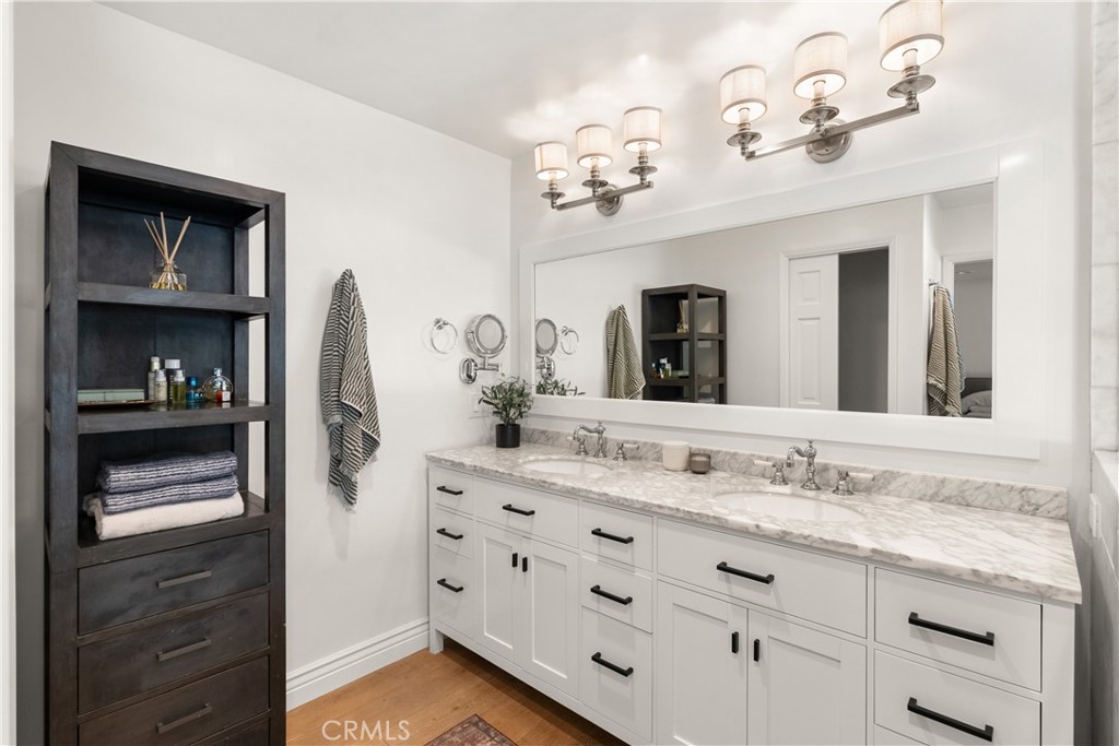 10442 Boca Canyon Drive North Tustin, CA 92705 - Photo 14 of 55 a bathroom with a sink double vanity and a mirror