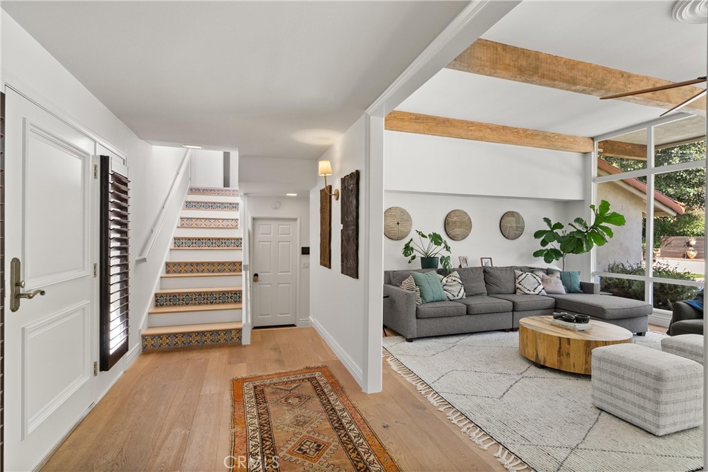 10442 Boca Canyon Drive North Tustin, CA 92705 - Photo 22 of 55 a living room with furniture and a rug