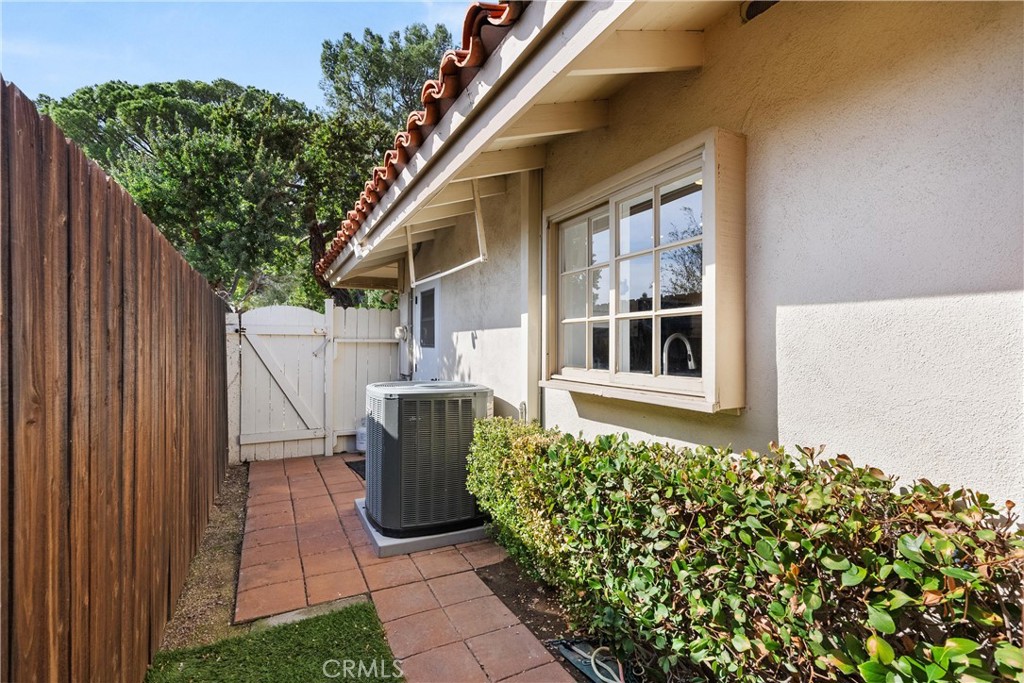 10442 Boca Canyon Drive North Tustin, CA 92705 - Photo 38 of 55 a front view of a house with a garden