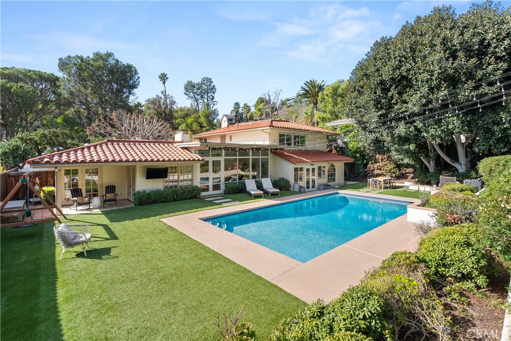 10442 Boca Canyon Drive North Tustin, CA 92705 - Photo 43 of 55 a view of a house with swimming pool and sitting area