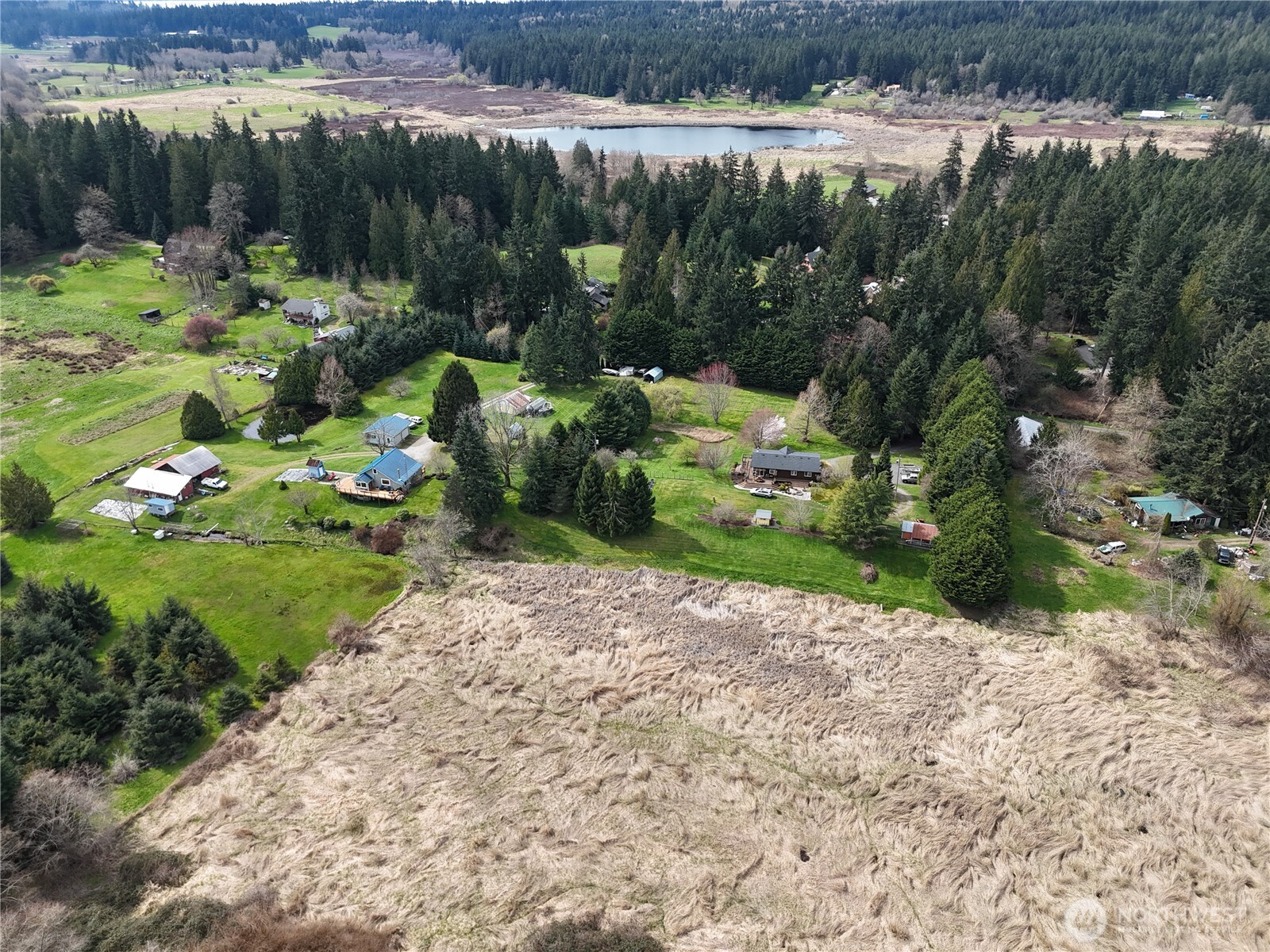 0 Midvale Road Clinton, WA 98236 - Photo 2 of 3 a view of a lake with a yard