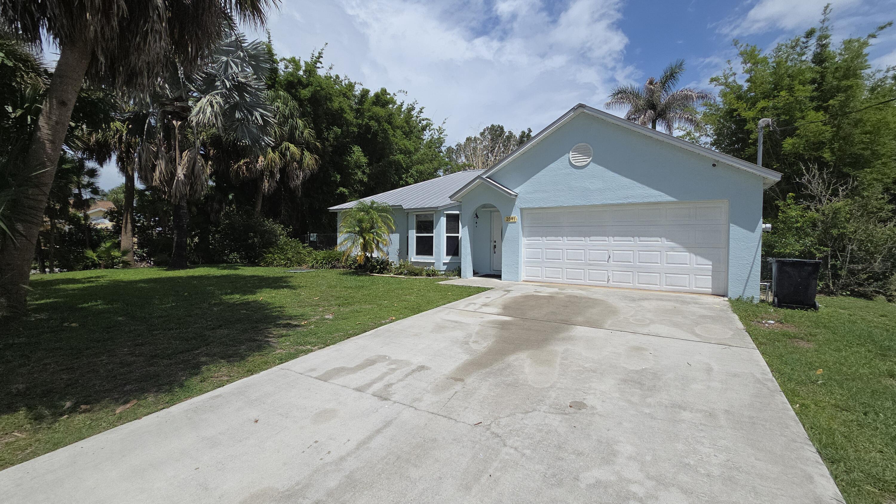 2091 Southwest Villanova Road Port St. Lucie, FL 34953 - Photo 1 of 20 20260601_150121
