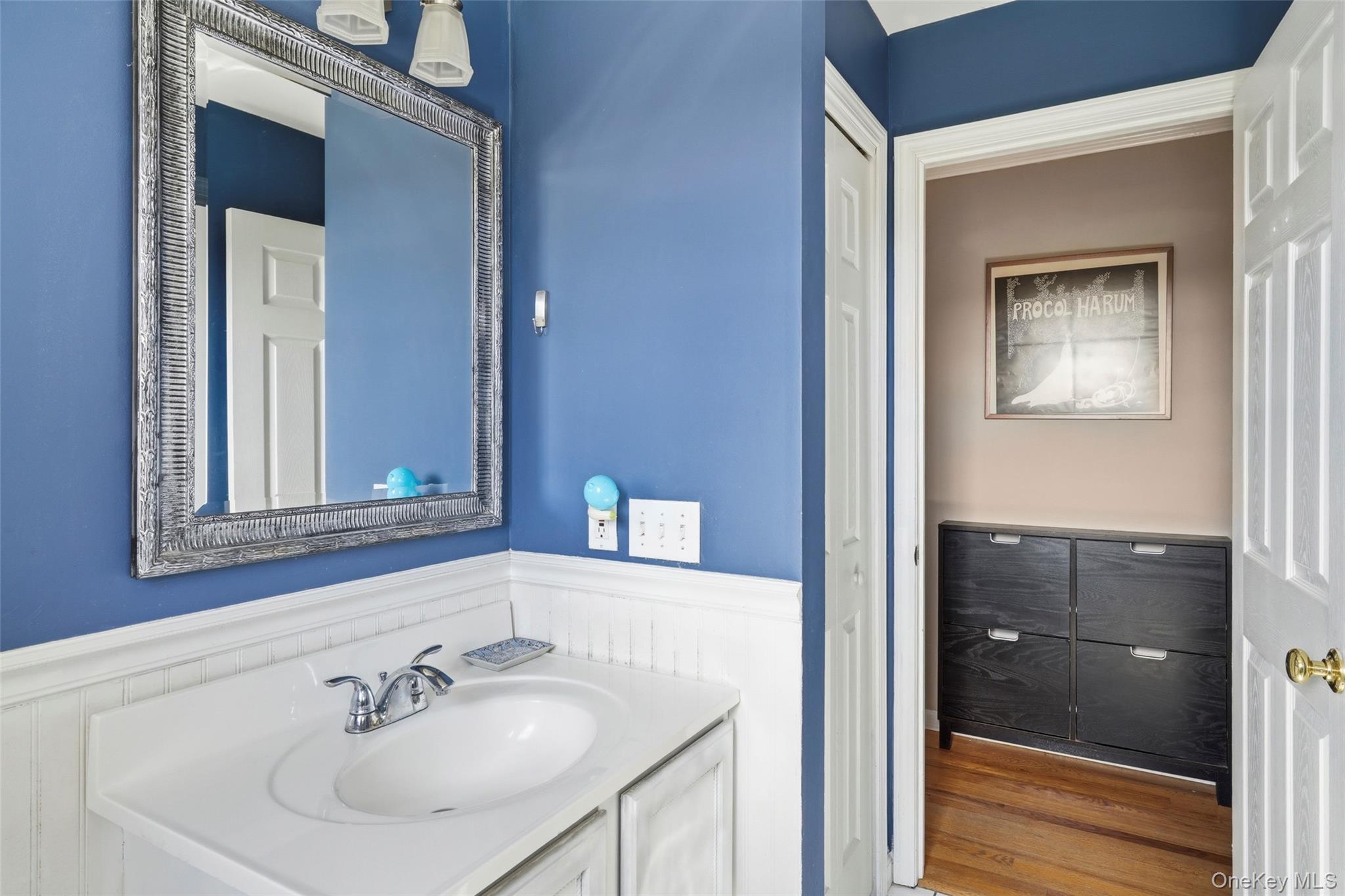 27 Ridgeview Drive Patterson, NY 12563 - Photo 19 of 40 1st Floor Powder Room w/wainscotting