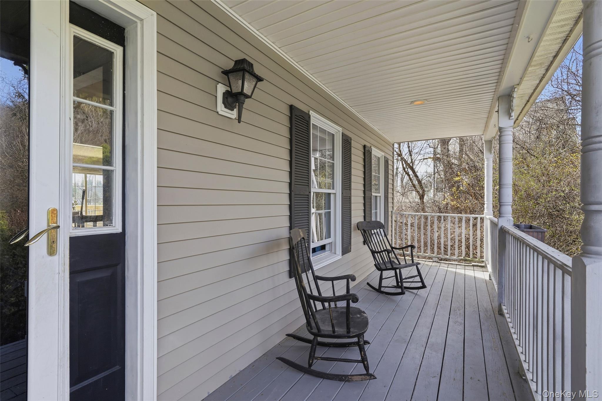 27 Ridgeview Drive Patterson, NY 12563 - Photo 2 of 40 Covered Front Porch ideal for relaxing and taking in the beautiful outdoors!