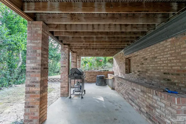 a view of a chairs with a table and chairs