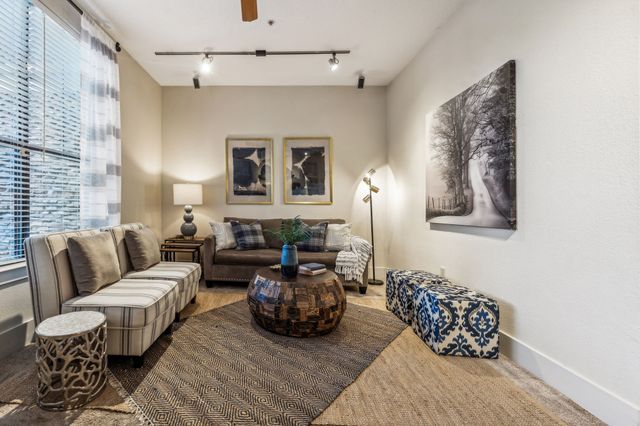 a living room with furniture and a couch