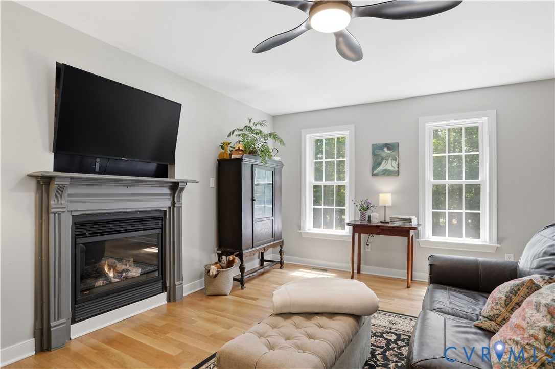 1570 Rock Castle Road Goochland, VA 23063 - Photo 5 of 53 Living area featuring a fireplace with a gray mant