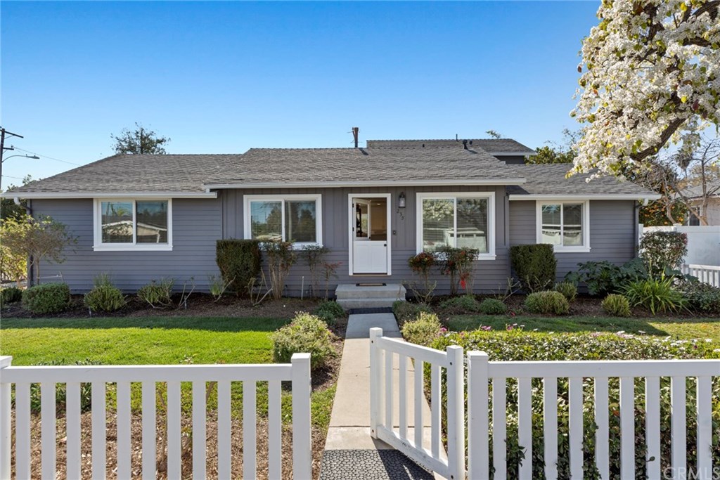 Much more than meets the eye! This darling home boasts nearly 2,100 SF of living space!
