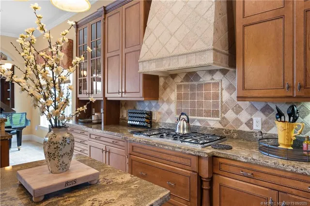 a bathroom with a tub a sink and a mirror