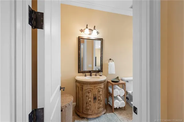 a roof deck with couch and a garden