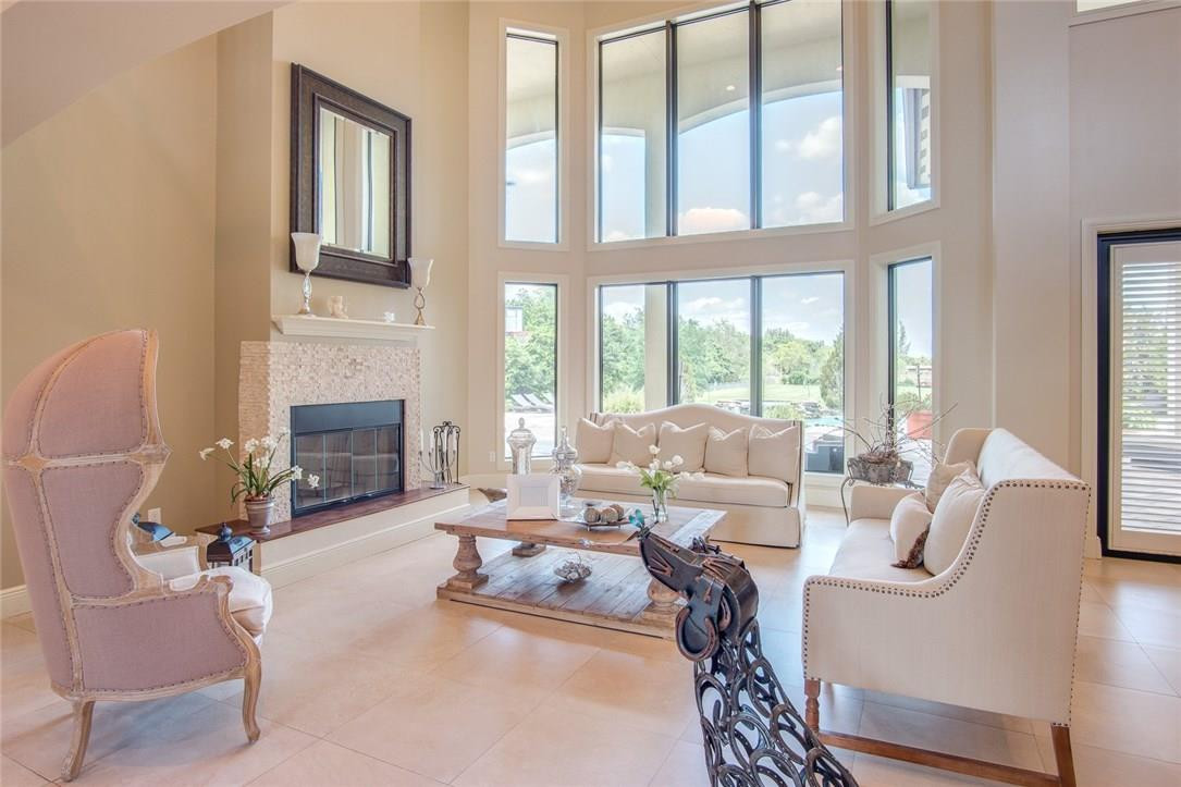 18091 Southwest 66th Street Southwest Ranches, FL 33331 - Photo 19 of 35 a living room with furniture fireplace and a large window