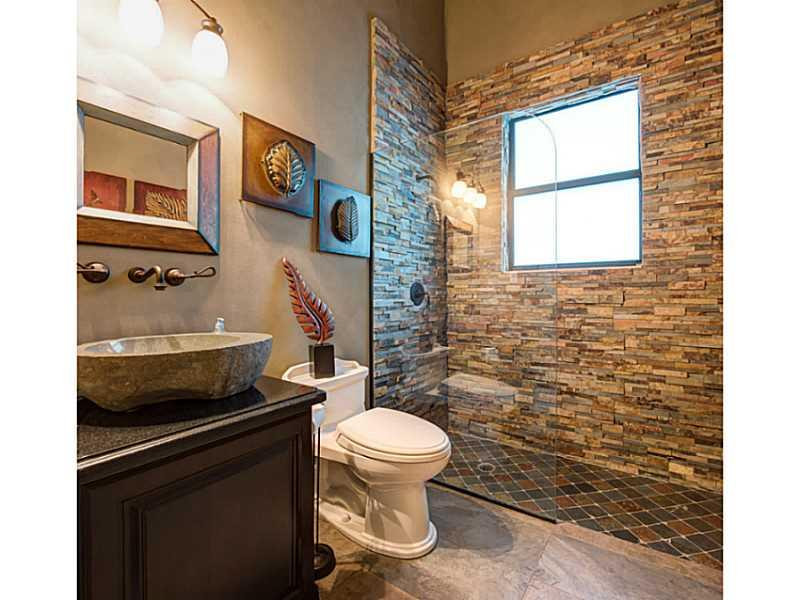 18091 Southwest 66th Street Southwest Ranches, FL 33331 - Photo 23 of 35 a bathroom with a toilet a sink and a window