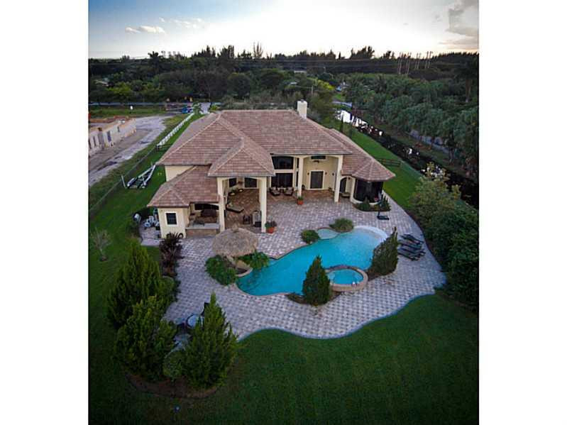 18091 Southwest 66th Street Southwest Ranches, FL 33331 - Photo 7 of 35 an aerial view of a house